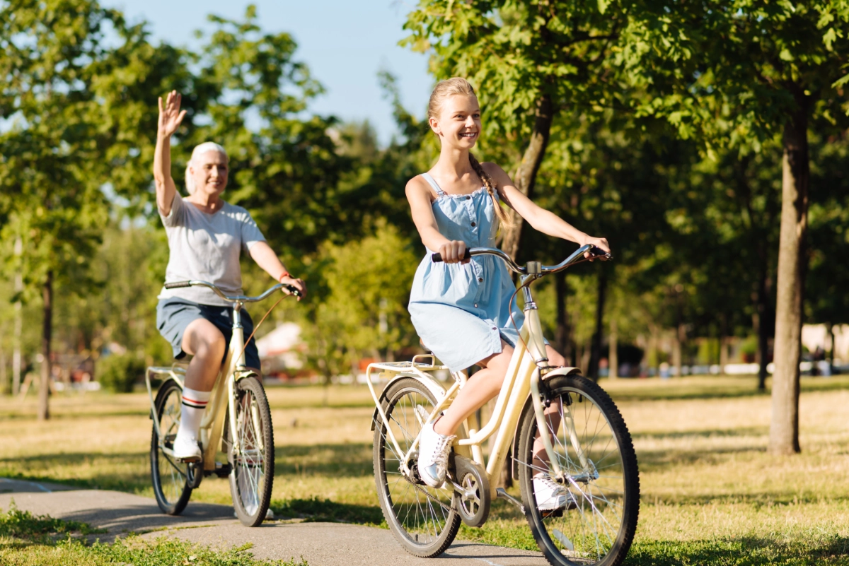 Grandmother And Grandchild On Bike Ride 1200X800